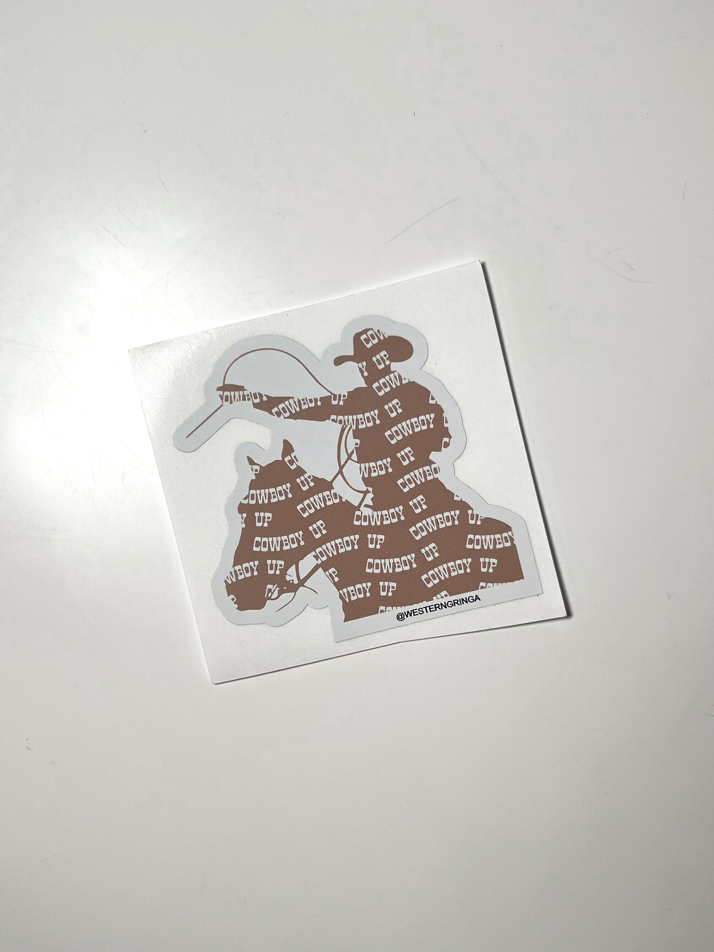 tan/white cowboy up sticker